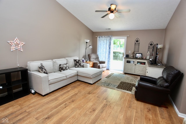 2909 Inverrary Ct, Indianapolis, IN 46234 - living room featuring light wood finished floors, ceiling fan, and vaulted ceiling