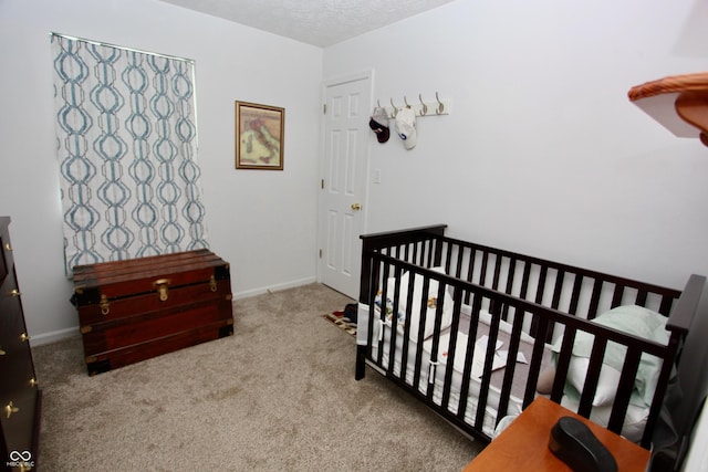 2909 Inverrary Ct, Indianapolis, IN 46234 - carpeted bedroom with a textured ceiling and a crib