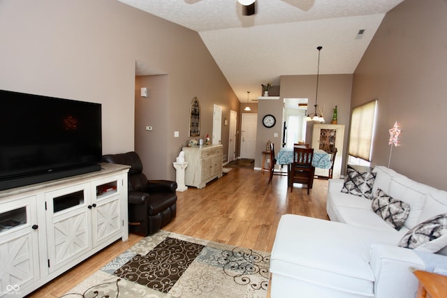 2909 Inverrary Ct, Indianapolis, IN 46234 - living room featuring light wood-type flooring, a ceiling fan, and high vaulted ceiling