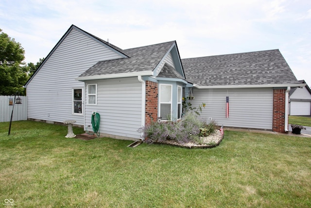2909 Inverrary Ct, Indianapolis, IN 46234 - view of side of property featuring a shingled roof and brick siding