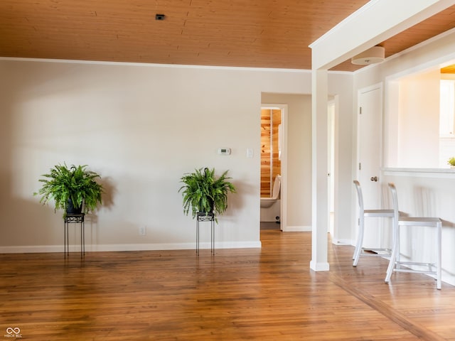 945 E Worthsville Rd, Greenwood, IN 46143 - unfurnished room featuring ornamental molding and wood finished floors