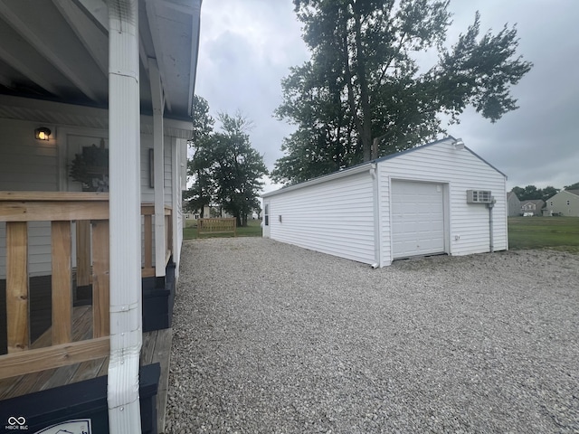 945 E Worthsville Rd, Greenwood, IN 46143 - detached garage with a wall unit AC