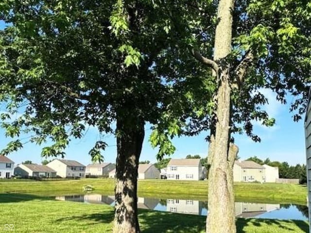 945 E Worthsville Rd, Greenwood, IN 46143 - surrounding community with a lawn, a water view, and a residential view