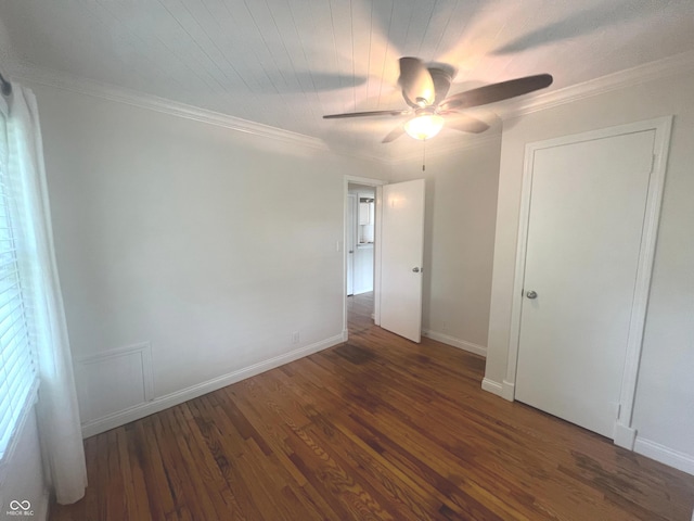 945 E Worthsville Rd, Greenwood, IN 46143 - unfurnished bedroom with wood finished floors, crown molding, and a ceiling fan
