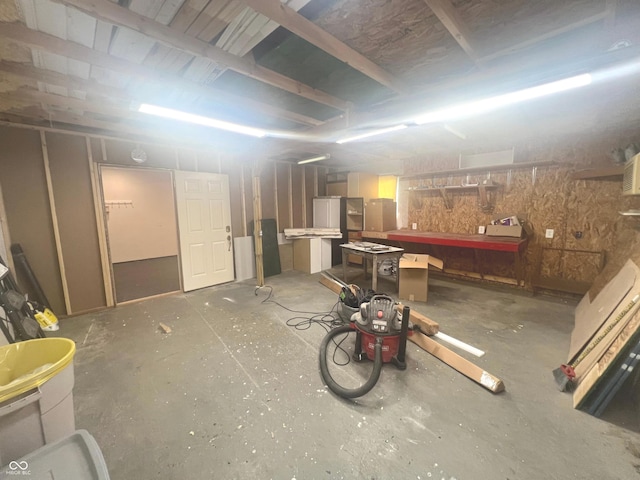945 E Worthsville Rd, Greenwood, IN 46143 - below grade area with a workshop area