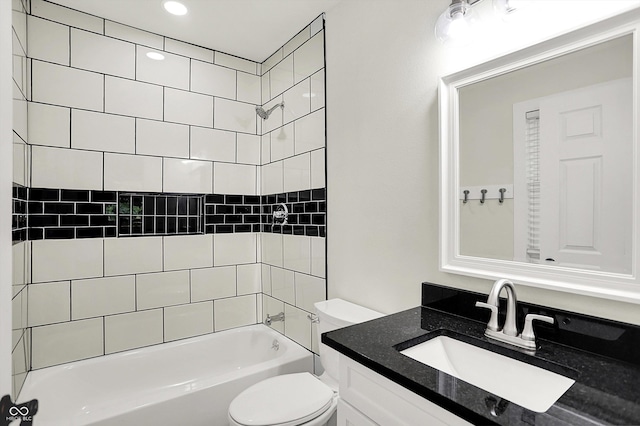 1923 N Parker Ave, Indianapolis, IN 46218 - bathroom featuring vanity, tub / shower combination, and recessed lighting