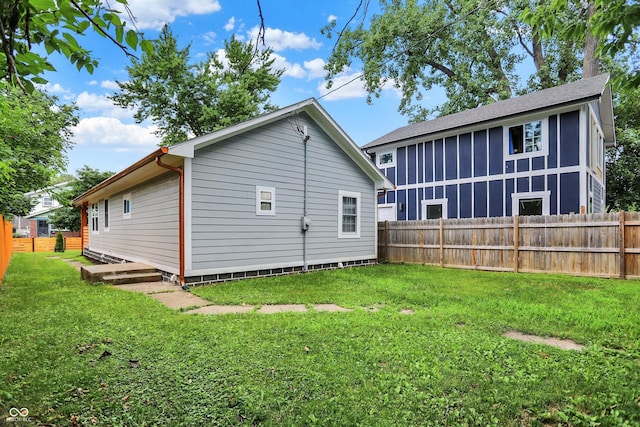 1923 N Parker Ave, Indianapolis, IN 46218 - rear view of house featuring a fenced backyard