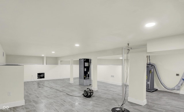 1923 N Parker Ave, Indianapolis, IN 46218 - workout area featuring water heater and recessed lighting