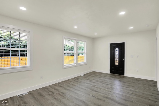 1923 N Parker Ave, Indianapolis, IN 46218 - foyer entrance featuring plenty of natural light, wood finished floors, and recessed lighting
