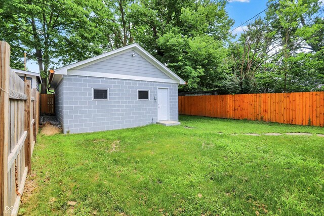 1923 N Parker Ave, Indianapolis, IN 46218 - fenced backyard with an outbuilding
