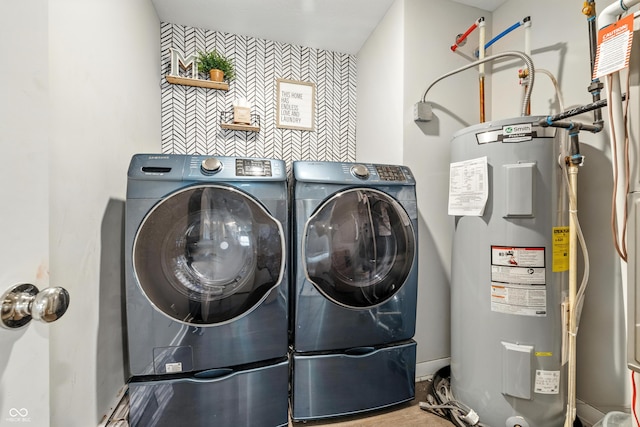 7225 Lockford S, Avon, IN 46123 - laundry room with electric water heater, washing machine and dryer, and an accent wall