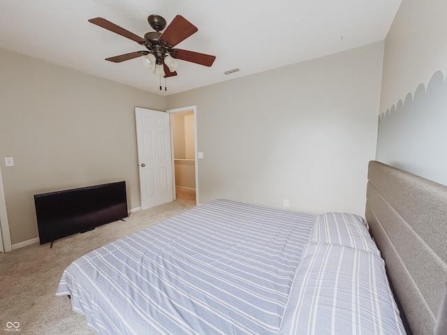 1381 Harrison Dr, Greenwood, IN 46143 - bedroom with light carpet and ceiling fan