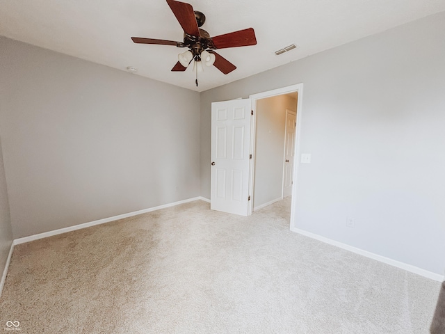 1381 Harrison Dr, Greenwood, IN 46143 - empty room featuring light colored carpet and a ceiling fan