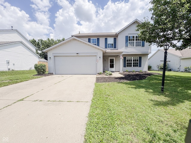 1381 Harrison Dr, Greenwood, IN 46143 - view of front of house featuring concrete driveway, an attached garage, and a front lawn
