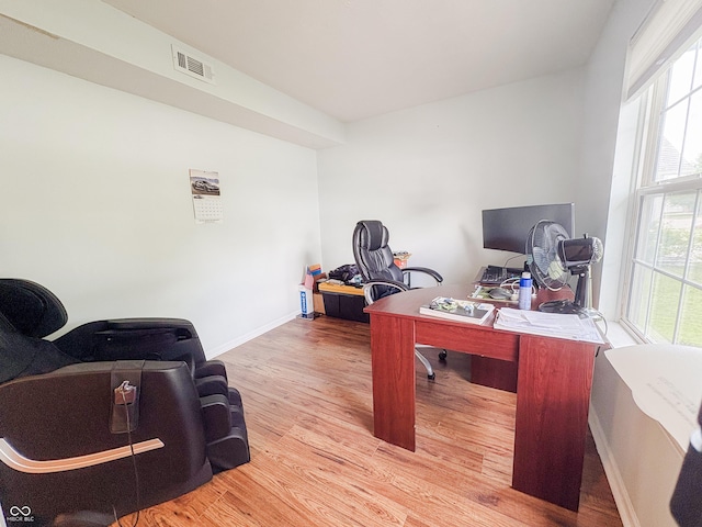 1381 Harrison Dr, Greenwood, IN 46143 - home office featuring wood finished floors and healthy amount of natural light