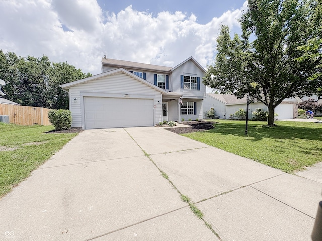 1381 Harrison Dr, Greenwood, IN 46143 - traditional-style home with an attached garage and driveway