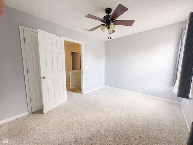 1381 Harrison Dr, Greenwood, IN 46143 - unfurnished bedroom with carpet flooring and ceiling fan