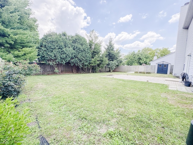 1381 Harrison Dr, Greenwood, IN 46143 - fenced backyard featuring a shed and a patio