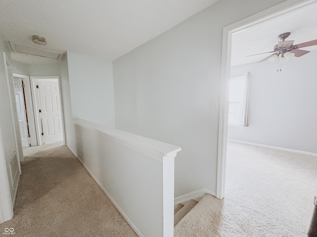 1381 Harrison Dr, Greenwood, IN 46143 - hall featuring carpet, an upstairs landing, and attic access