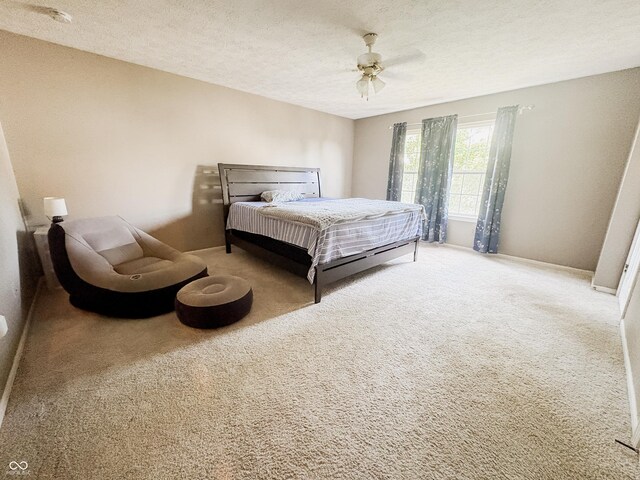 1381 Harrison Dr, Greenwood, IN 46143 - bedroom with carpet floors, a textured ceiling, and ceiling fan