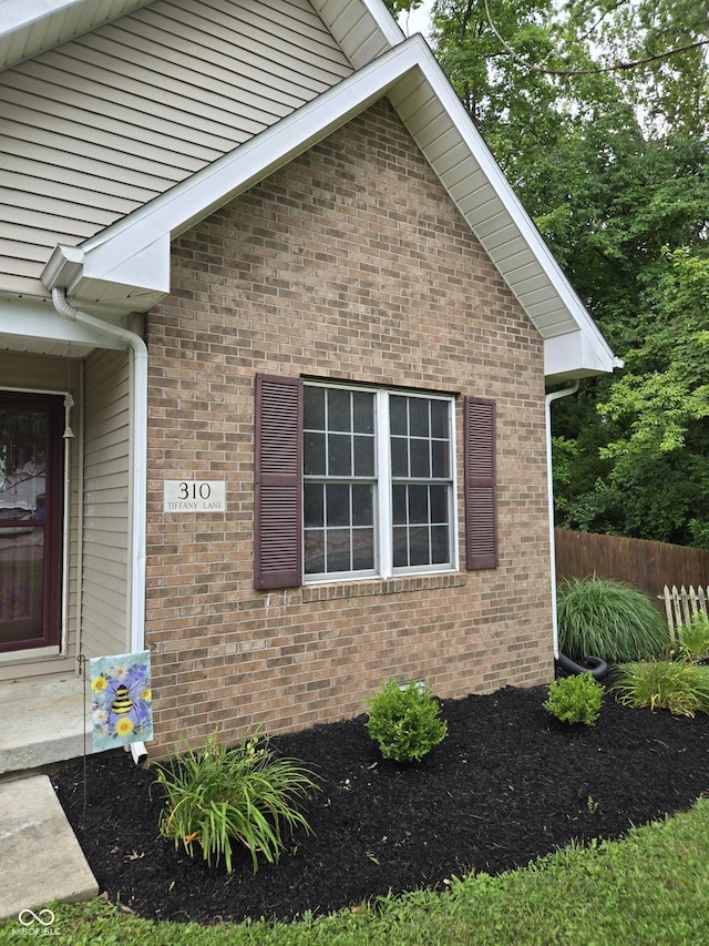 310 Tiffany Ln, North Vernon, IN 47265 - view of property exterior with brick siding