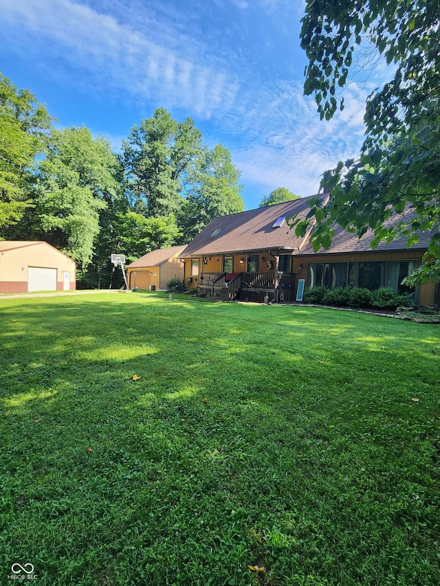 6774 S Becks Grove Rd, Freetown, IN 47235 - view of grassy yard with a detached garage