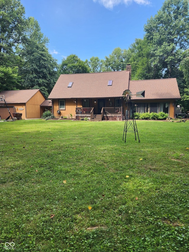6774 S Becks Grove Rd, Freetown, IN 47235 - rear view of property featuring a yard, a chimney, and a shingled roof