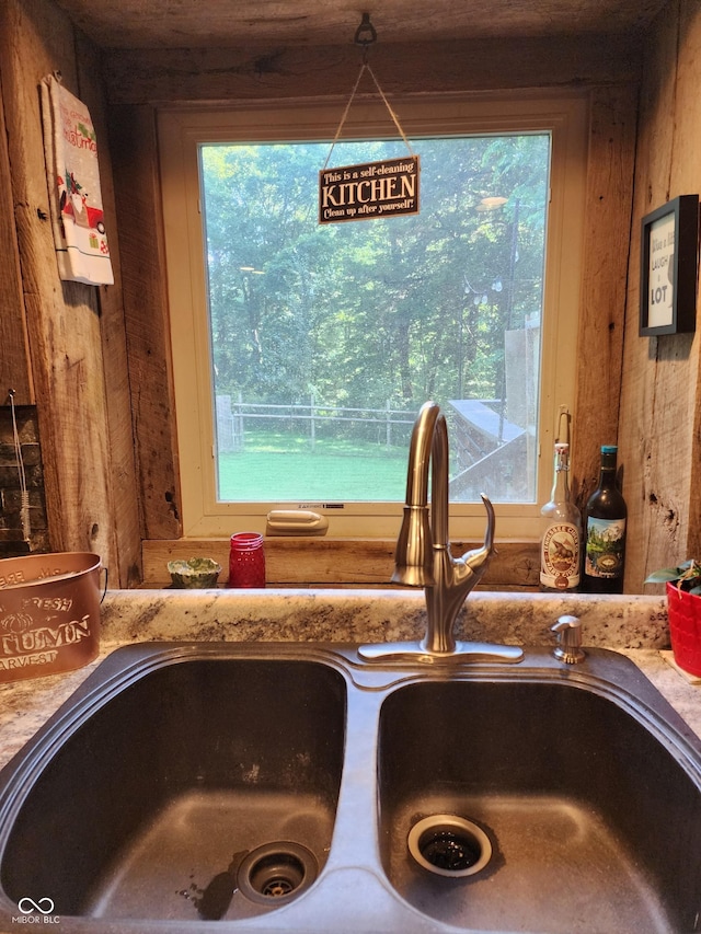 6774 S Becks Grove Rd, Freetown, IN 47235 - kitchen view of a sink and wood walls