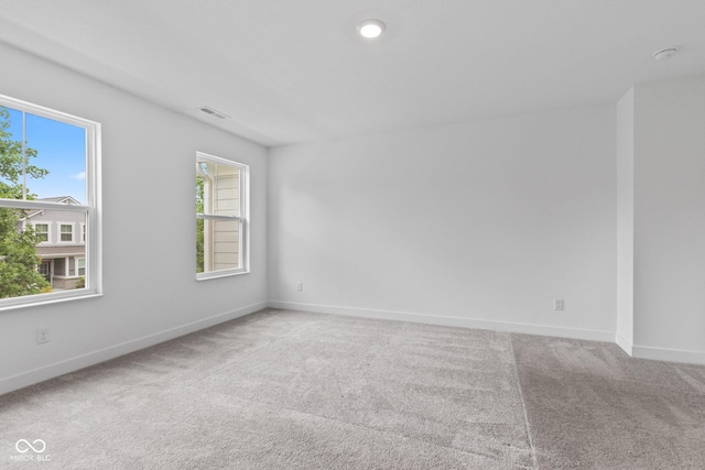 7265 Governors Row, Avon, IN 46123 - spare room with light carpet and a smoke detector
