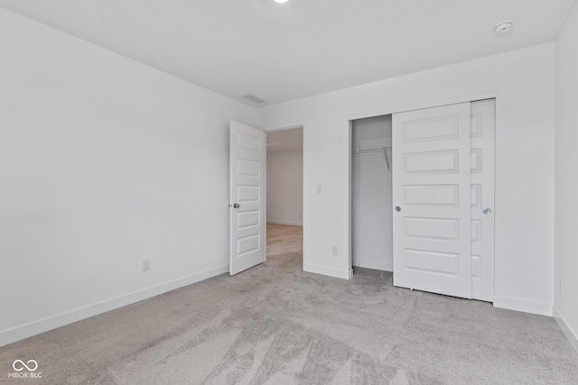 7265 Governors Row, Avon, IN 46123 - unfurnished bedroom featuring carpet and a closet