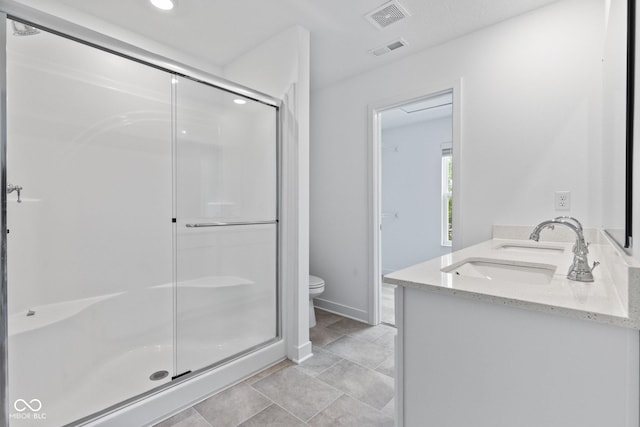 7265 Governors Row, Avon, IN 46123 - bathroom with a stall shower, double vanity, and recessed lighting