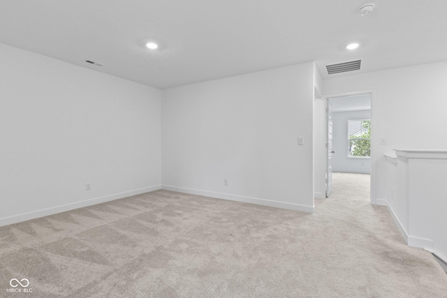 7265 Governors Row, Avon, IN 46123 - empty room with light carpet, a smoke detector, and recessed lighting