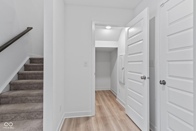 7265 Governors Row, Avon, IN 46123 - staircase featuring wood finished floors and baseboards