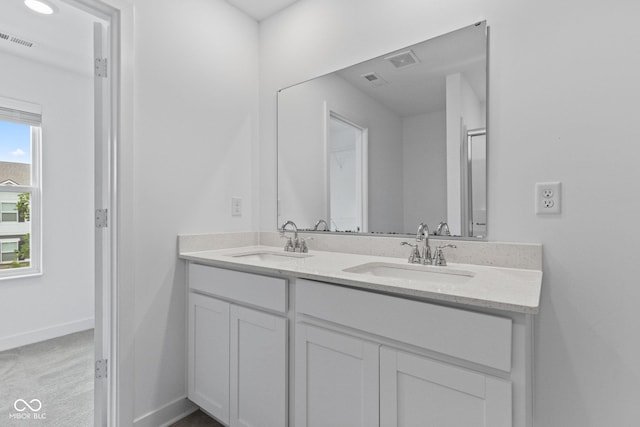7265 Governors Row, Avon, IN 46123 - full bath featuring double vanity and baseboards
