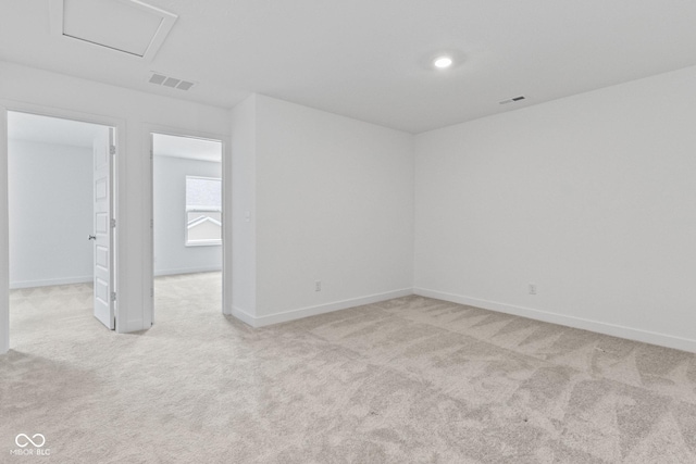 7265 Governors Row, Avon, IN 46123 - empty room with light carpet and attic access