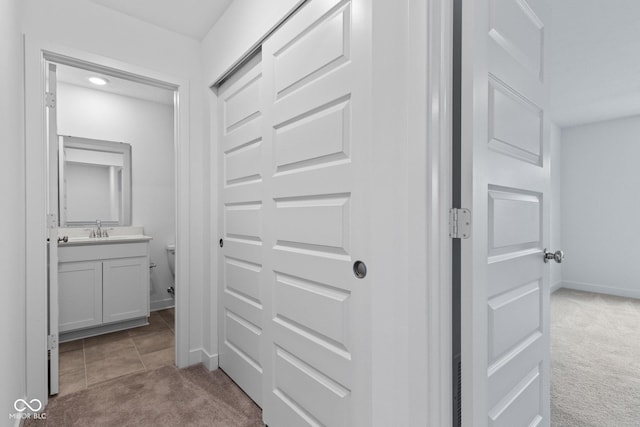 7265 Governors Row, Avon, IN 46123 - hallway with carpet floors and baseboards