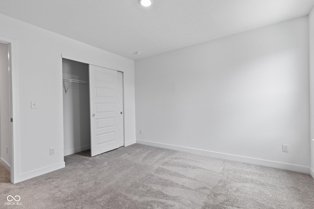 7265 Governors Row, Avon, IN 46123 - unfurnished bedroom featuring carpet floors and a closet