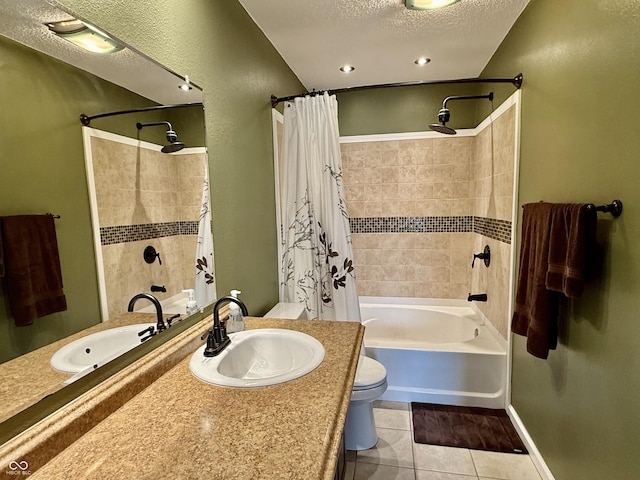 6309 Monteo Dr, Indianapolis, IN 46217 - bathroom featuring tile patterned flooring, vanity, shower / tub combo, and a textured ceiling