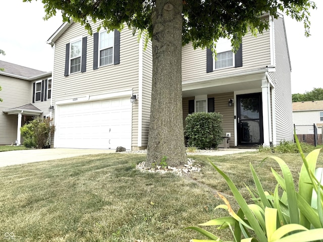 6309 Monteo Dr, Indianapolis, IN 46217 - traditional-style home featuring a garage and concrete driveway