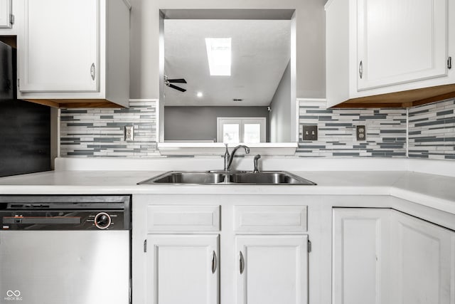 12956 Shandon Ln, Fishers, IN 46038 - kitchen with dishwasher, light countertops, white cabinets, and tasteful backsplash