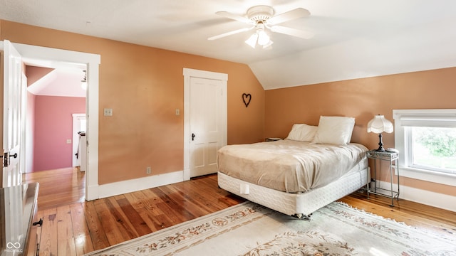 429 W Washington St, Shelbyville, IN 46176 - bedroom featuring wood finished floors, lofted ceiling, and ceiling fan