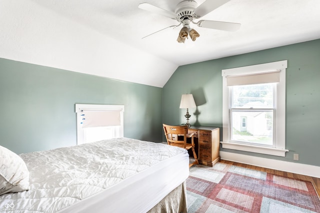 429 W Washington St, Shelbyville, IN 46176 - bedroom with wood finished floors, vaulted ceiling, and a ceiling fan