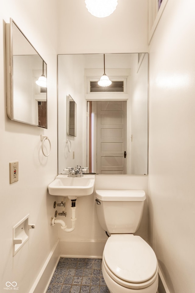 429 W Washington St, Shelbyville, IN 46176 - half bathroom with baseboards and toilet