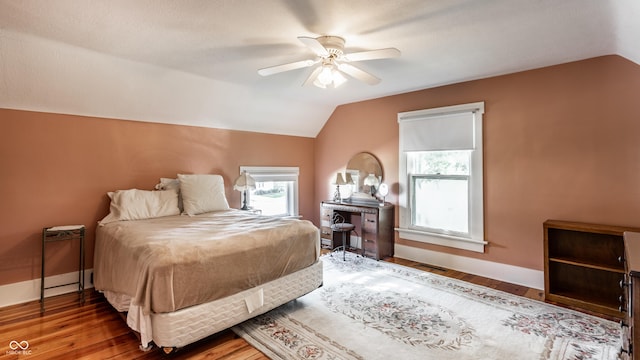 429 W Washington St, Shelbyville, IN 46176 - bedroom with lofted ceiling, multiple windows, wood finished floors, and ceiling fan