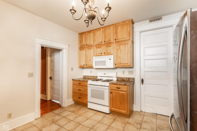 429 W Washington St, Shelbyville, IN 46176 - kitchen featuring white appliances, a chandelier, light brown cabinetry, and light tile patterned floors
