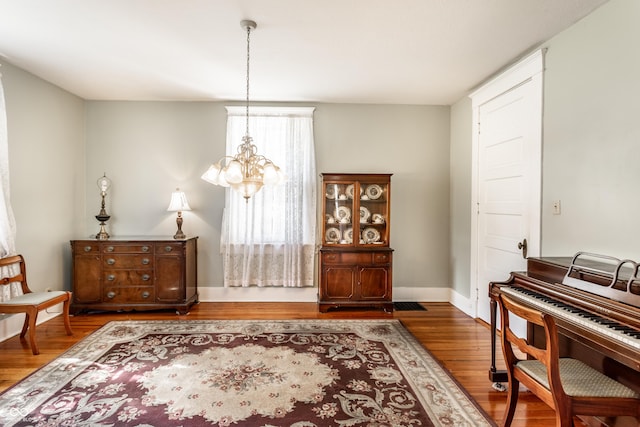 429 W Washington St, Shelbyville, IN 46176 - entrance foyer featuring a chandelier and wood finished floors