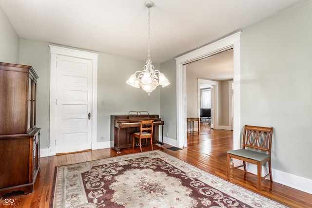 429 W Washington St, Shelbyville, IN 46176 - dining area with hardwood / wood-style floors and a chandelier