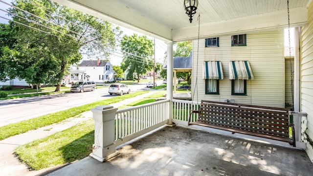 429 W Washington St, Shelbyville, IN 46176 - covered porch with a residential view