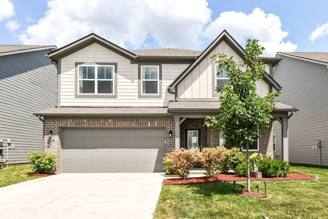 2234 S Bingham Pl, New Palestine, IN 46163 - craftsman house featuring brick siding, a front lawn, a garage, and driveway