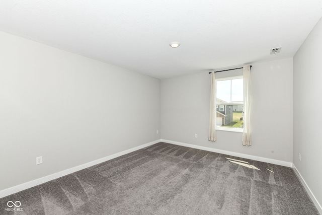 2234 S Bingham Pl, New Palestine, IN 46163 - empty room featuring dark carpet and baseboards